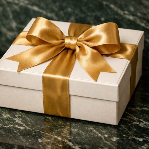A Importância do Laço de Fita Dourado: O Toque Final de Mestre na Embalagem de Confeitaria